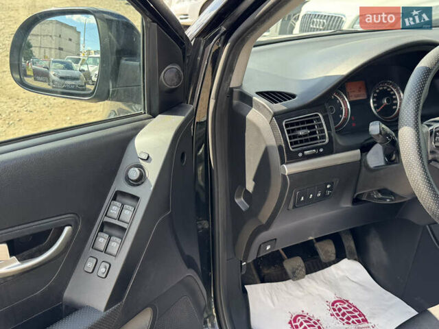 Черный Cанг Йонг Корандо, объемом двигателя 2 л и пробегом 169 тыс. км за 8900 $, фото 11 на Automoto.ua