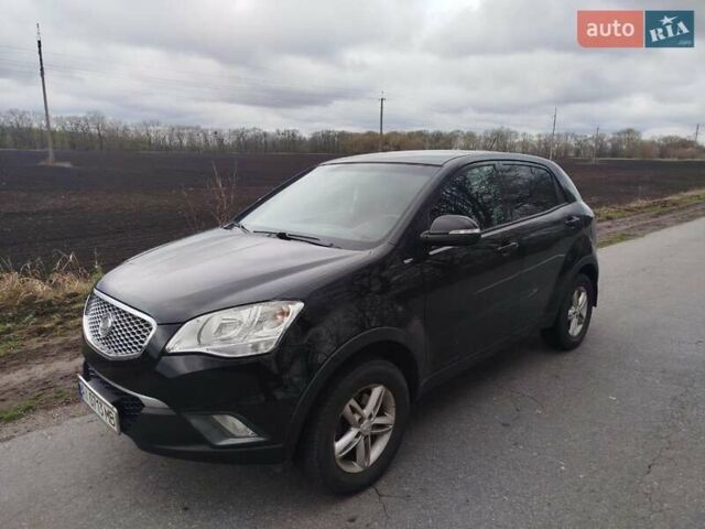 Чорний Cанг Йонг Korando, об'ємом двигуна 2 л та пробігом 130 тис. км за 10000 $, фото 4 на Automoto.ua