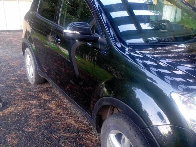 Черный Cанг Йонг Корандо, объемом двигателя 2 л и пробегом 180 тыс. км за 7711 $, фото 3 на Automoto.ua