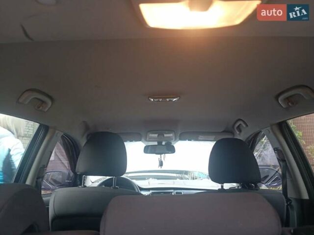 Черный Cанг Йонг Корандо, объемом двигателя 2 л и пробегом 176 тыс. км за 8500 $, фото 7 на Automoto.ua