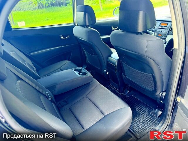 Чорний Cанг Йонг Korando, об'ємом двигуна 2 л та пробігом 76 тис. км за 9500 $, фото 4 на Automoto.ua