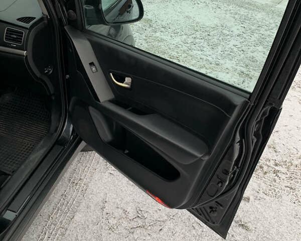 Чорний Cанг Йонг Korando, об'ємом двигуна 2 л та пробігом 260 тис. км за 9600 $, фото 2 на Automoto.ua