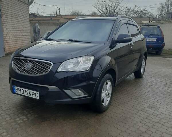 Чорний Cанг Йонг Korando, об'ємом двигуна 2 л та пробігом 144 тис. км за 9400 $, фото 2 на Automoto.ua