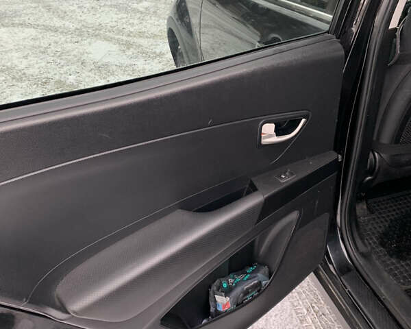 Чорний Cанг Йонг Korando, об'ємом двигуна 2 л та пробігом 260 тис. км за 9600 $, фото 9 на Automoto.ua