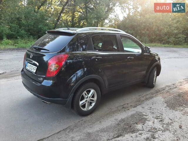 Чорний Cанг Йонг Korando, об'ємом двигуна 2 л та пробігом 149 тис. км за 6999 $, фото 6 на Automoto.ua