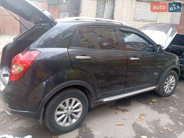 Черный Cанг Йонг Корандо, объемом двигателя 2 л и пробегом 176 тыс. км за 8500 $, фото 4 на Automoto.ua