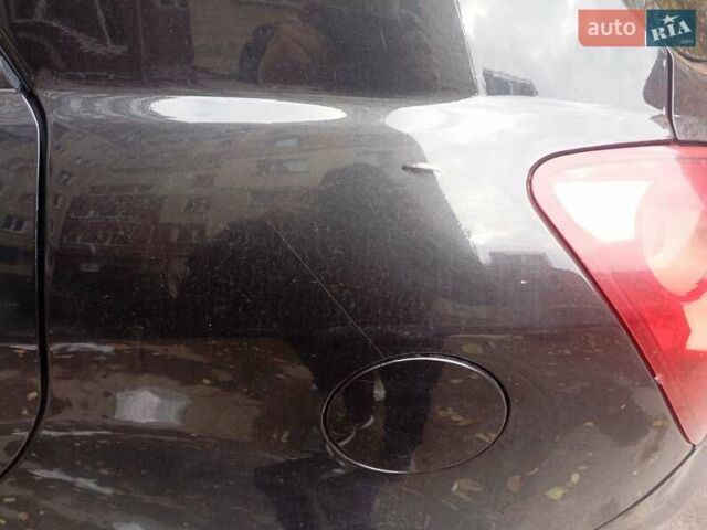 Черный Cанг Йонг Корандо, объемом двигателя 2 л и пробегом 176 тыс. км за 8500 $, фото 15 на Automoto.ua