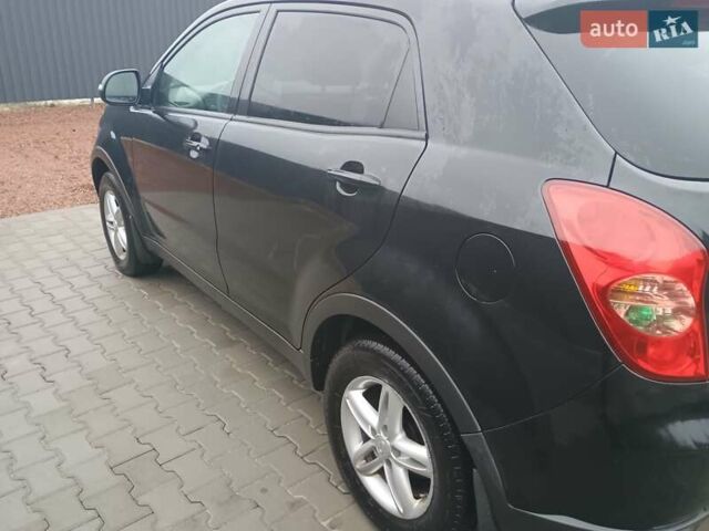 Черный Cанг Йонг Корандо, объемом двигателя 2 л и пробегом 165 тыс. км за 8200 $, фото 15 на Automoto.ua