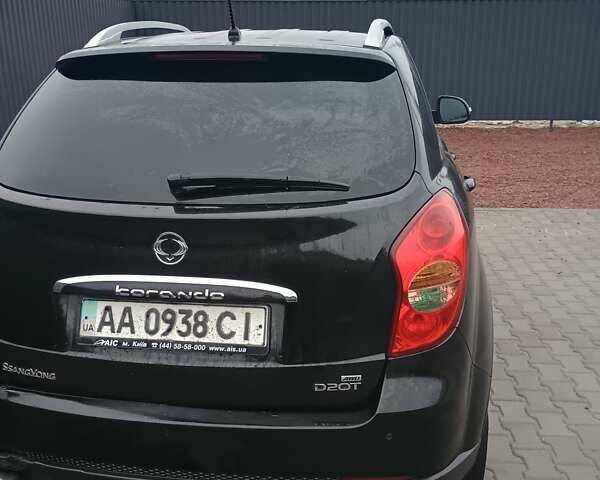 Черный Cанг Йонг Корандо, объемом двигателя 2 л и пробегом 165 тыс. км за 8200 $, фото 18 на Automoto.ua