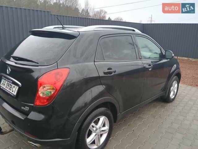 Черный Cанг Йонг Корандо, объемом двигателя 2 л и пробегом 165 тыс. км за 8200 $, фото 14 на Automoto.ua