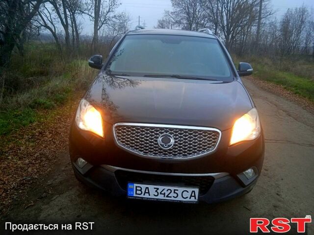 Черный Cанг Йонг Корандо, объемом двигателя 2 л и пробегом 316 тыс. км за 8800 $, фото 2 на Automoto.ua