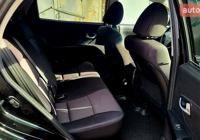 Черный Cанг Йонг Корандо, объемом двигателя 2 л и пробегом 100 тыс. км за 8300 $, фото 14 на Automoto.ua