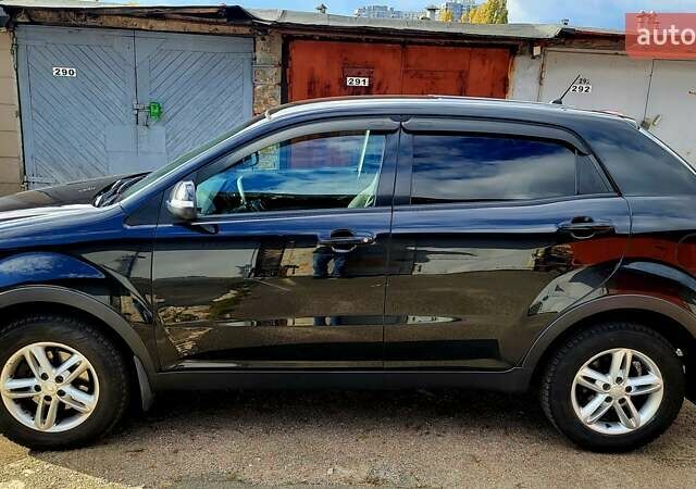 Черный Cанг Йонг Корандо, объемом двигателя 2 л и пробегом 100 тыс. км за 8300 $, фото 2 на Automoto.ua