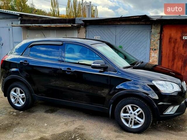 Черный Cанг Йонг Корандо, объемом двигателя 2 л и пробегом 100 тыс. км за 8300 $, фото 9 на Automoto.ua