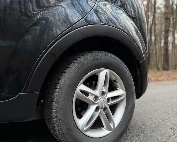 Чорний Cанг Йонг Korando, об'ємом двигуна 2 л та пробігом 163 тис. км за 8100 $, фото 9 на Automoto.ua