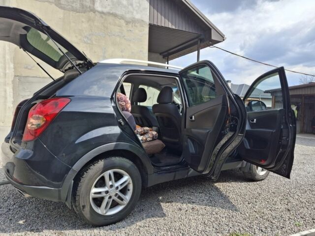 Черный Cанг Йонг Корандо, объемом двигателя 2 л и пробегом 126 тыс. км за 8200 $, фото 5 на Automoto.ua