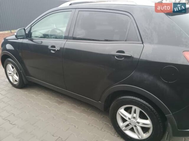 Черный Cанг Йонг Корандо, объемом двигателя 2 л и пробегом 165 тыс. км за 8200 $, фото 19 на Automoto.ua