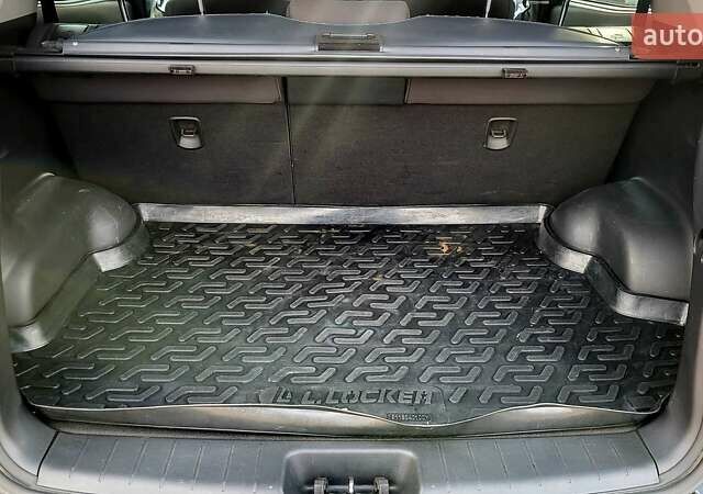 Черный Cанг Йонг Корандо, объемом двигателя 2 л и пробегом 100 тыс. км за 8300 $, фото 6 на Automoto.ua