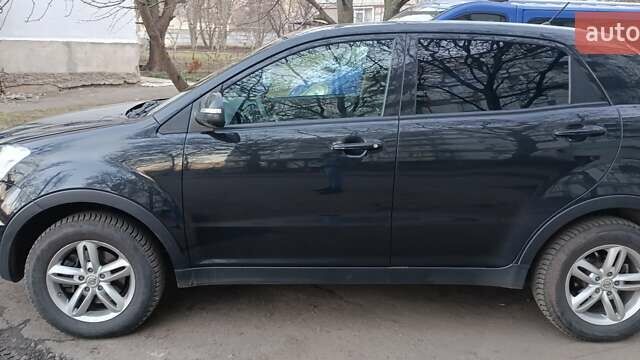 Чорний Cанг Йонг Korando, об'ємом двигуна 2 л та пробігом 52 тис. км за 12600 $, фото 5 на Automoto.ua