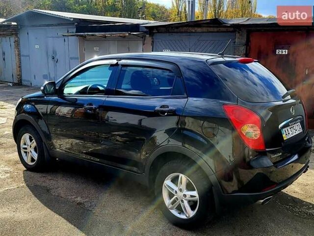 Черный Cанг Йонг Корандо, объемом двигателя 2 л и пробегом 100 тыс. км за 8300 $, фото 3 на Automoto.ua