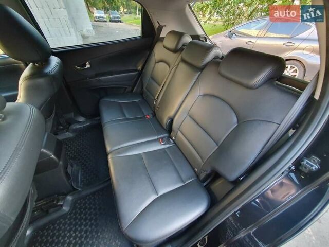Чорний Cанг Йонг Korando, об'ємом двигуна 2 л та пробігом 108 тис. км за 10500 $, фото 14 на Automoto.ua