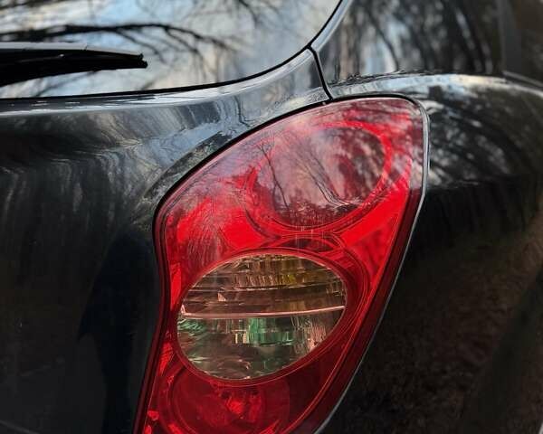 Чорний Cанг Йонг Korando, об'ємом двигуна 2 л та пробігом 163 тис. км за 8100 $, фото 10 на Automoto.ua