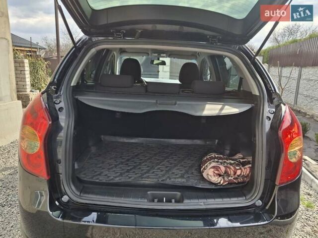 Чорний Cанг Йонг Korando, об'ємом двигуна 2 л та пробігом 126 тис. км за 9200 $, фото 7 на Automoto.ua