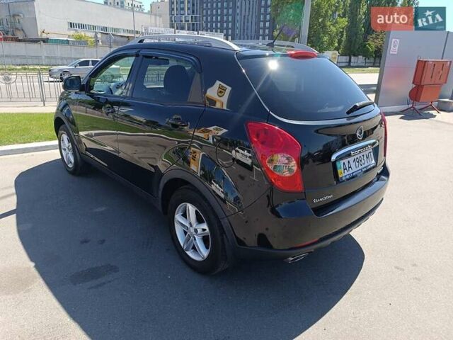 Чорний Cанг Йонг Korando, об'ємом двигуна 2 л та пробігом 158 тис. км за 9000 $, фото 4 на Automoto.ua