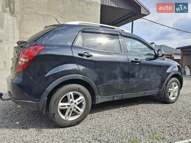 Чорний Cанг Йонг Korando, об'ємом двигуна 2 л та пробігом 126 тис. км за 9200 $, фото 6 на Automoto.ua