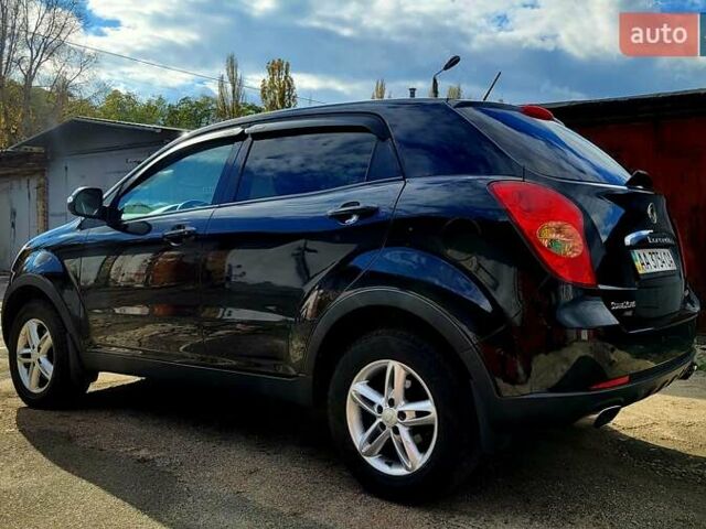 Черный Cанг Йонг Корандо, объемом двигателя 2 л и пробегом 100 тыс. км за 8300 $, фото 4 на Automoto.ua