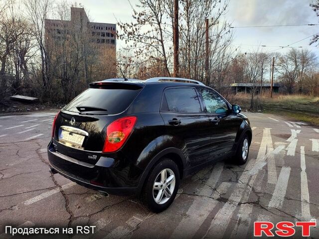 Чорний Cанг Йонг Korando, об'ємом двигуна 2 л та пробігом 130 тис. км за 11500 $, фото 10 на Automoto.ua