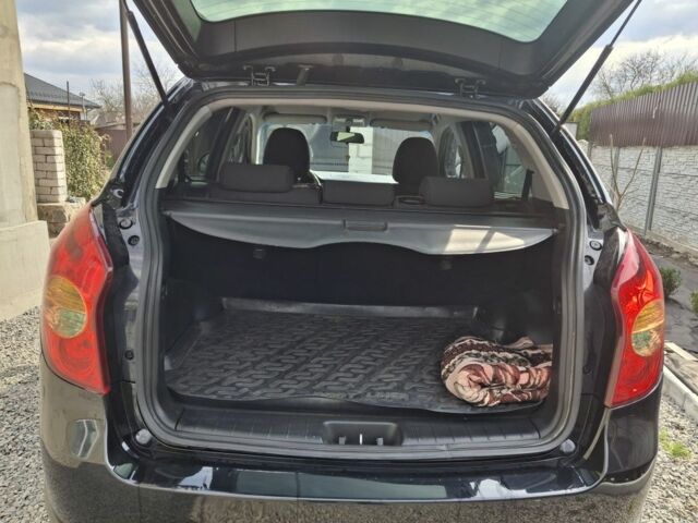 Черный Cанг Йонг Корандо, объемом двигателя 2 л и пробегом 126 тыс. км за 8200 $, фото 4 на Automoto.ua