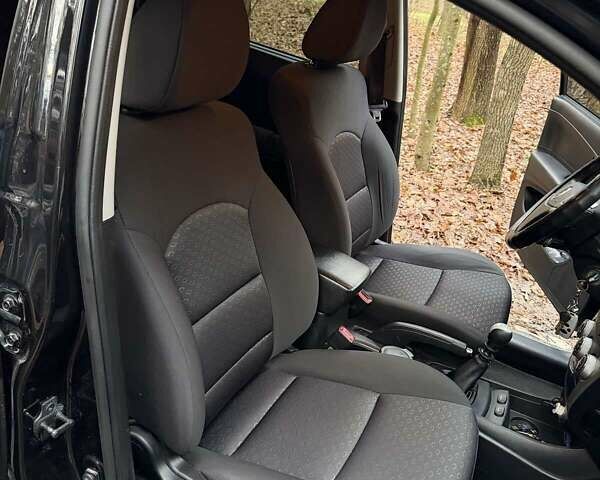 Чорний Cанг Йонг Korando, об'ємом двигуна 2 л та пробігом 163 тис. км за 8100 $, фото 23 на Automoto.ua