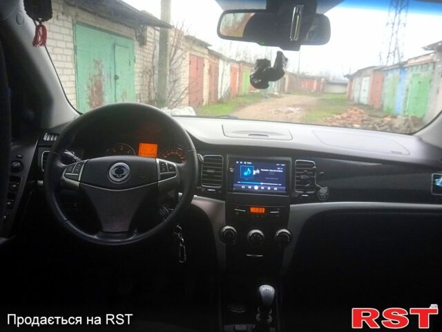 Черный Cанг Йонг Корандо, объемом двигателя 2 л и пробегом 316 тыс. км за 8800 $, фото 6 на Automoto.ua