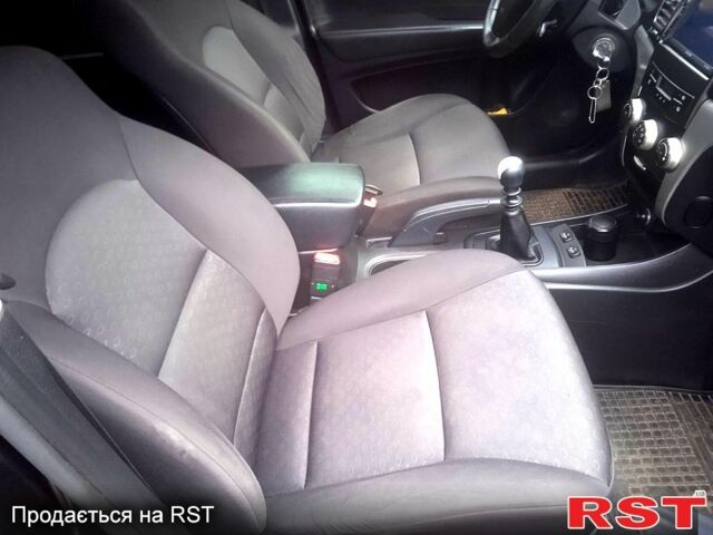 Черный Cанг Йонг Корандо, объемом двигателя 2 л и пробегом 316 тыс. км за 8800 $, фото 7 на Automoto.ua