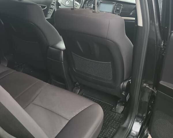 Черный Cанг Йонг Корандо, объемом двигателя 2 л и пробегом 165 тыс. км за 8200 $, фото 5 на Automoto.ua