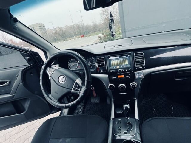 Черный Cанг Йонг Корандо, объемом двигателя 2 л и пробегом 55 тыс. км за 11650 $, фото 11 на Automoto.ua