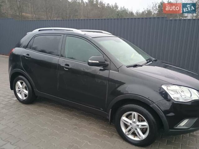 Черный Cанг Йонг Корандо, объемом двигателя 2 л и пробегом 165 тыс. км за 8200 $, фото 11 на Automoto.ua