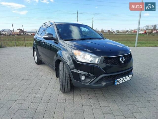 Черный Cанг Йонг Корандо, объемом двигателя 2 л и пробегом 163 тыс. км за 10599 $, фото 11 на Automoto.ua