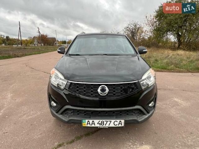 Черный Cанг Йонг Корандо, объемом двигателя 2 л и пробегом 116 тыс. км за 9500 $, фото 1 на Automoto.ua