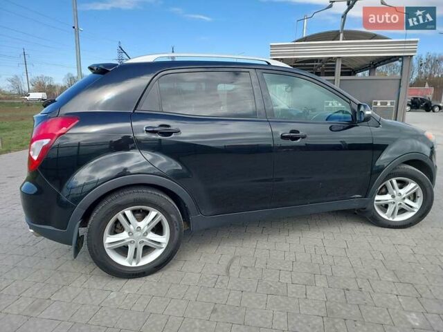 Черный Cанг Йонг Корандо, объемом двигателя 2 л и пробегом 163 тыс. км за 10599 $, фото 4 на Automoto.ua