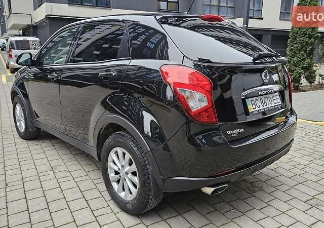 Черный Cанг Йонг Корандо, объемом двигателя 2 л и пробегом 173 тыс. км за 9000 $, фото 6 на Automoto.ua