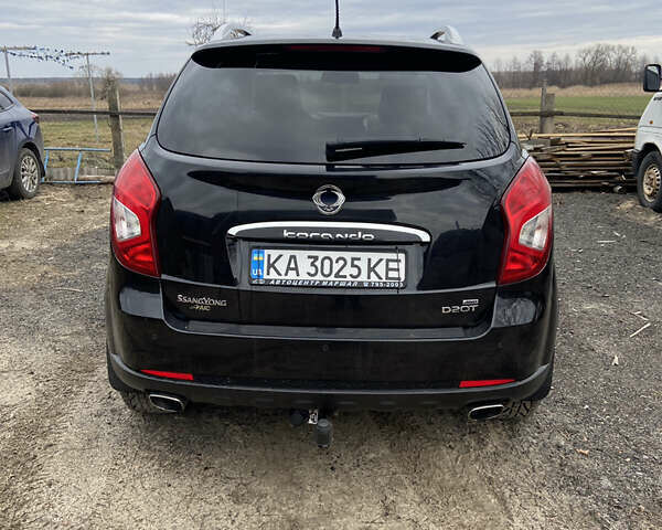 Чорний Cанг Йонг Korando, об'ємом двигуна 2 л та пробігом 156 тис. км за 10500 $, фото 6 на Automoto.ua