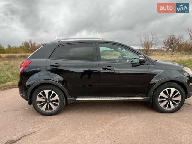 Черный Cанг Йонг Корандо, объемом двигателя 2 л и пробегом 116 тыс. км за 9500 $, фото 3 на Automoto.ua