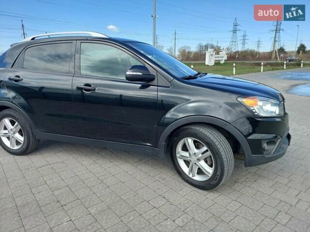 Черный Cанг Йонг Корандо, объемом двигателя 2 л и пробегом 163 тыс. км за 10599 $, фото 3 на Automoto.ua