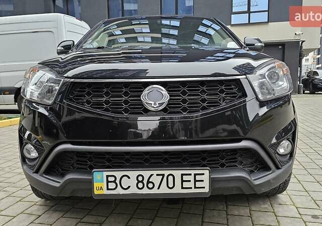 Черный Cанг Йонг Корандо, объемом двигателя 2 л и пробегом 173 тыс. км за 9000 $, фото 2 на Automoto.ua