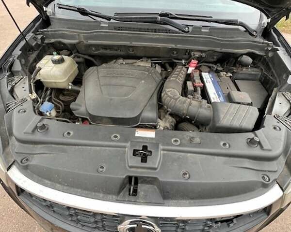 Черный Cанг Йонг Корандо, объемом двигателя 2 л и пробегом 116 тыс. км за 9500 $, фото 17 на Automoto.ua