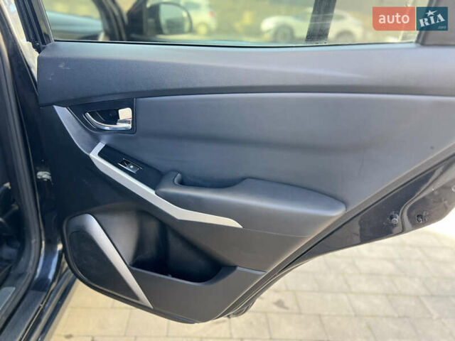 Чорний Cанг Йонг Korando, об'ємом двигуна 2 л та пробігом 173 тис. км за 9200 $, фото 21 на Automoto.ua