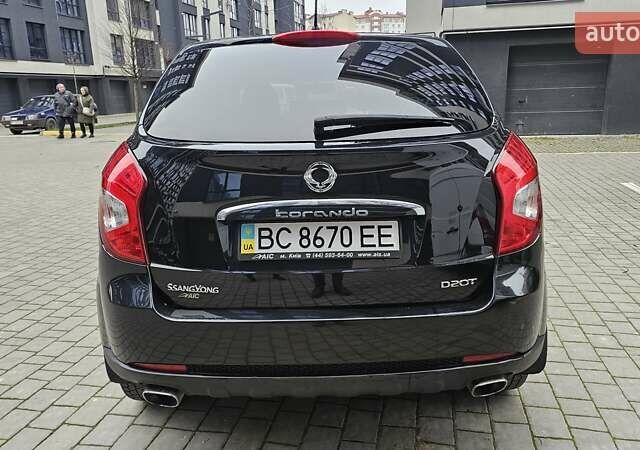 Черный Cанг Йонг Корандо, объемом двигателя 2 л и пробегом 173 тыс. км за 9000 $, фото 7 на Automoto.ua