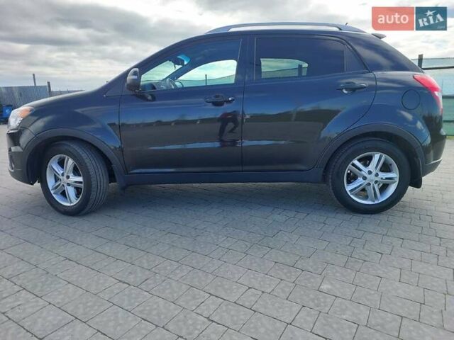 Черный Cанг Йонг Корандо, объемом двигателя 2 л и пробегом 163 тыс. км за 10599 $, фото 8 на Automoto.ua